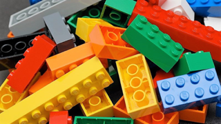 LEGOs are made of ABS (https://hackaday.com/2018/12/11/abs-three-plastics-in-one/)