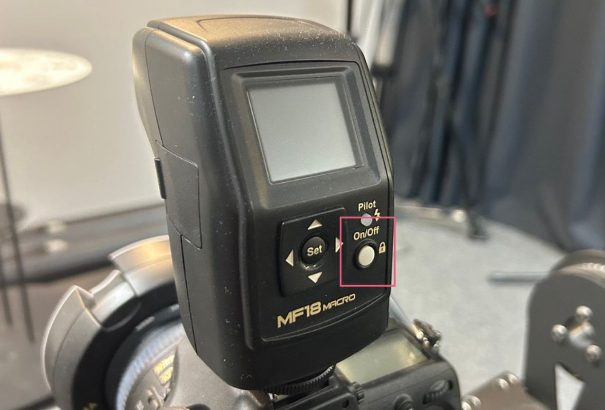 Camera flash on button